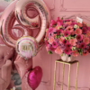 globos y gerberas